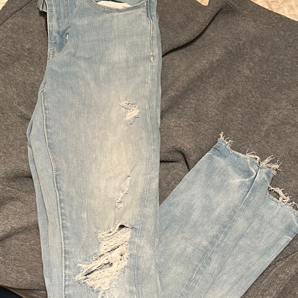 Distressed Light Blue Denim Jeans